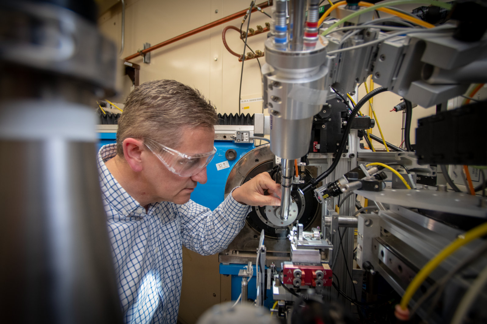 Photo - Marc Allaire works on an ALS beamline in this May 2019 photo. (Credit: Thor Swift/Berkeley Lab)