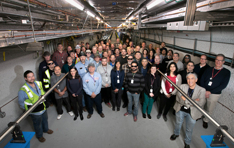 Photo - Members of the Berkeley Lab and SLAC undulator teams in the undulator tunnel at SLAC. (Courtesy of Matthaeus Leitner/Berkeley Lab)
