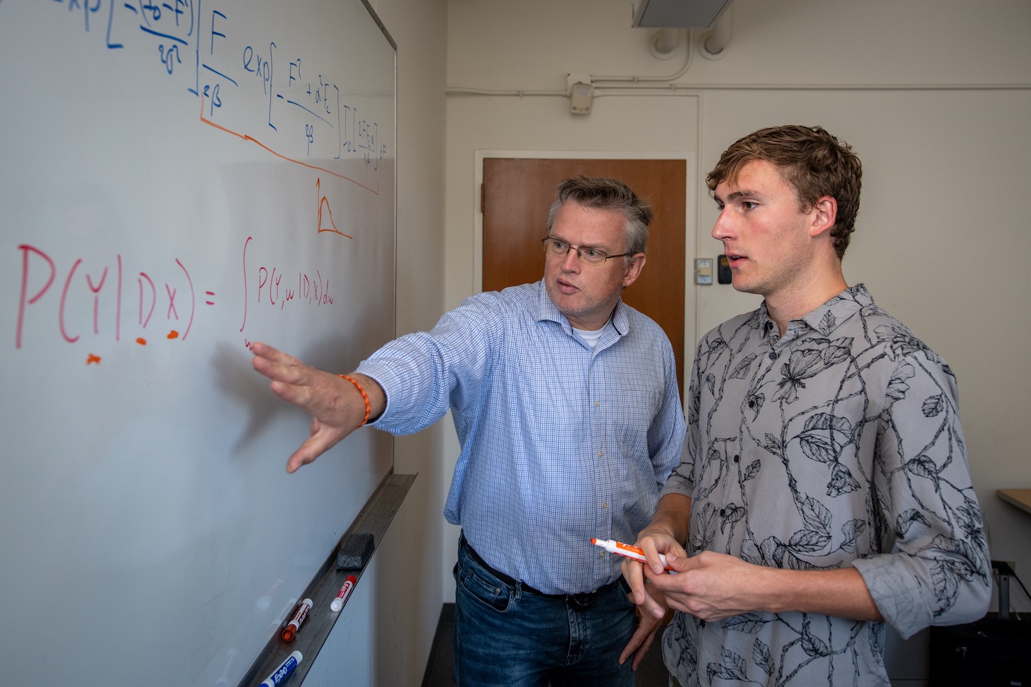 Berkeley Lab intern and scientist working together on algorithms for crystallography 