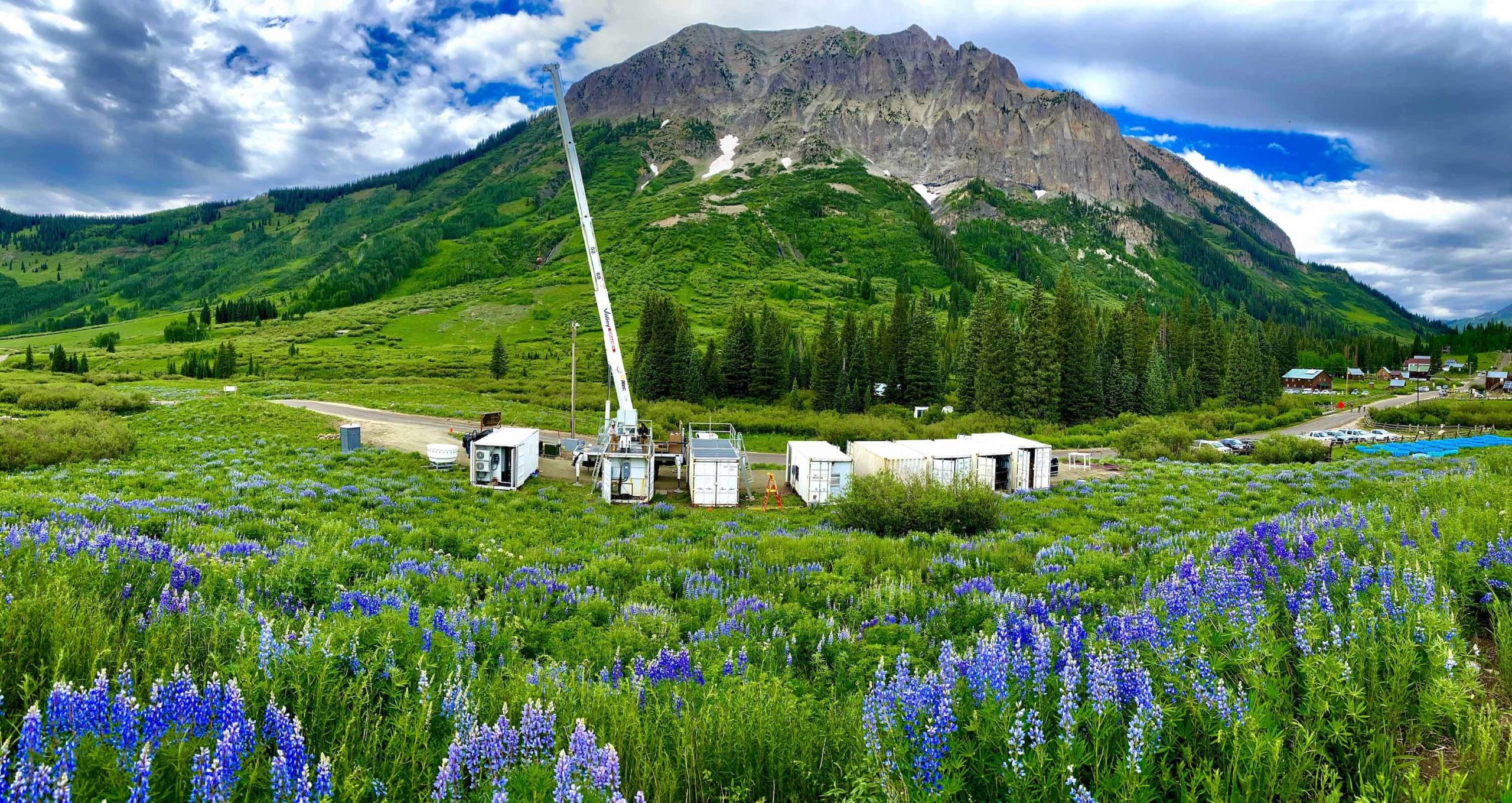 Shipping containers set in beautiful mountain landscape