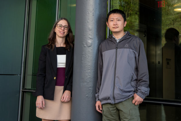 Francesca Toma (left) and Guiji Liu outside the Liquid Sunlight Alliance building at Berkeley Lab. (Credit: Thor Swift/Berkeley Lab)