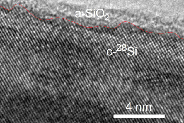 Transmission electron microscopy image showing a silicon-28 nanowire coated with silicon dioxide (SiO2).