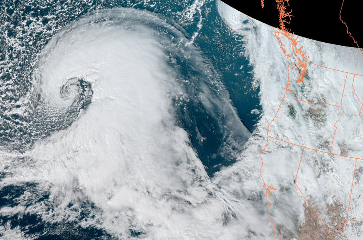 Satellite image of a bomb cyclone over the Pacific Ocean and Western US.