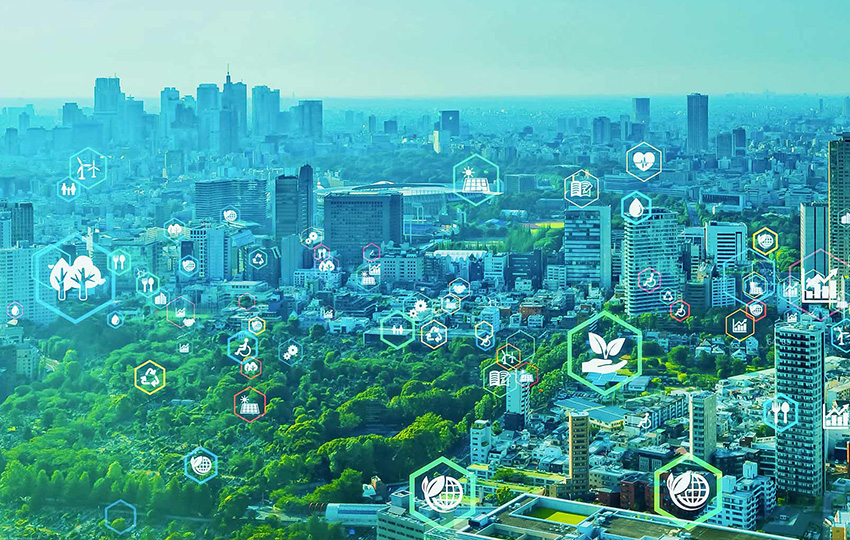 Environmental technology concept image. Various environmentally focused icons are placed overtop of a green and blue tinted city-scape.