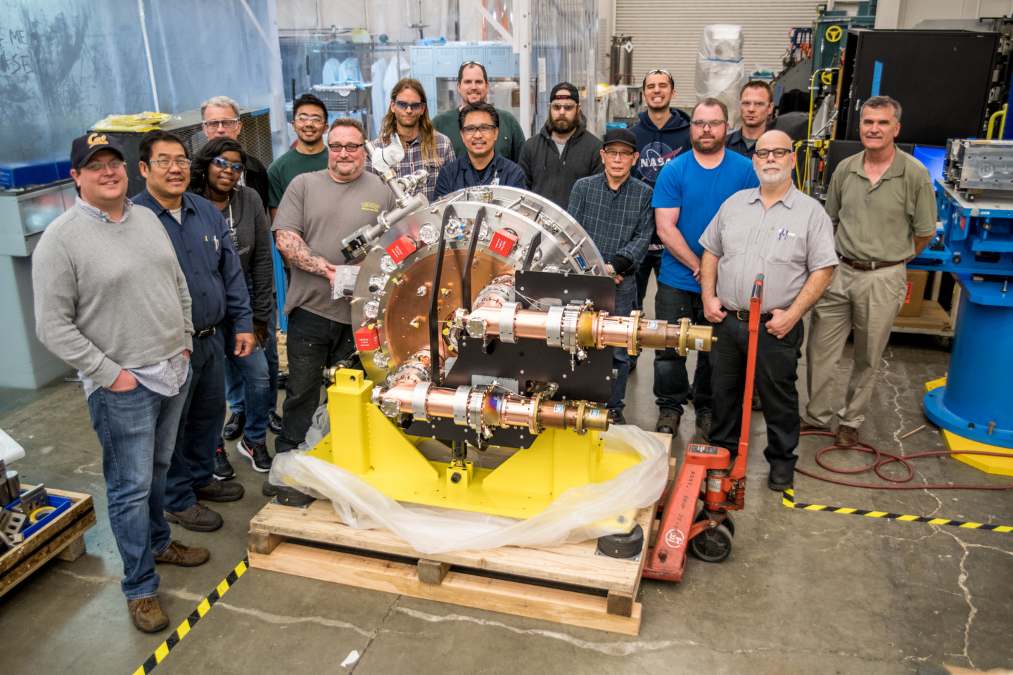 Group photo with the LCLS-II injector that is prepared for shipment to SLAC.