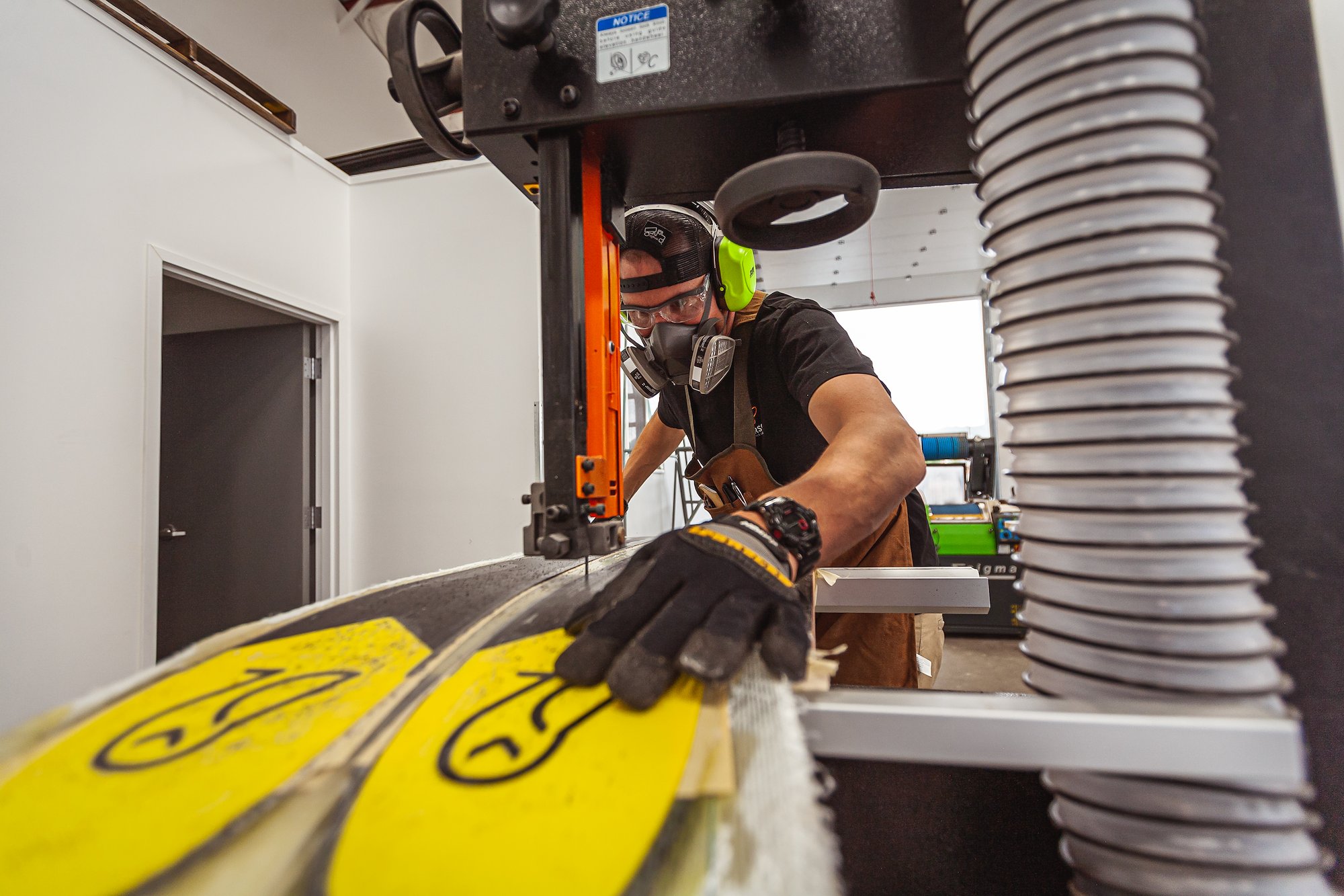 A technician developing skis.