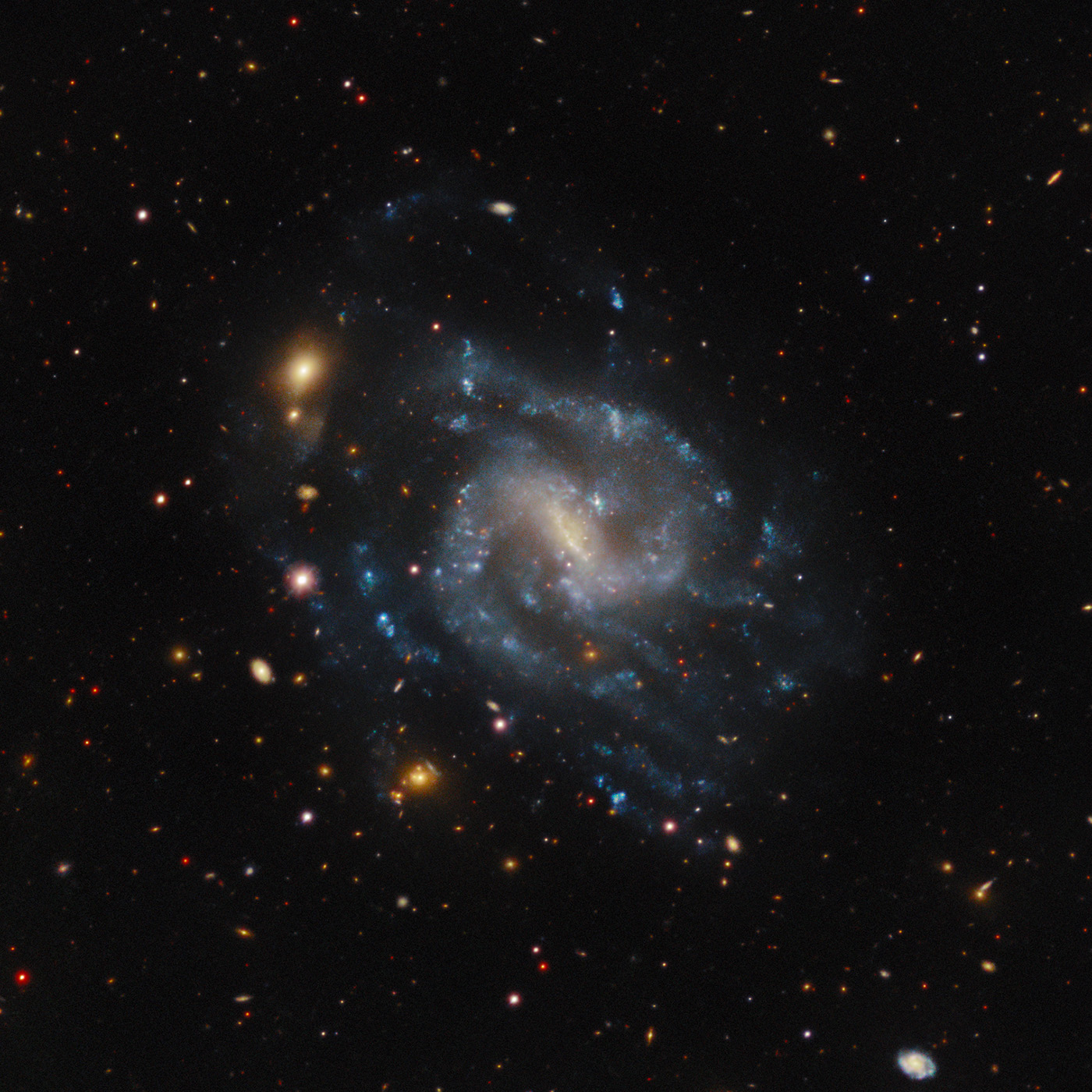 IC 4212, a barred spiral galaxy located in the constellation Virgo.