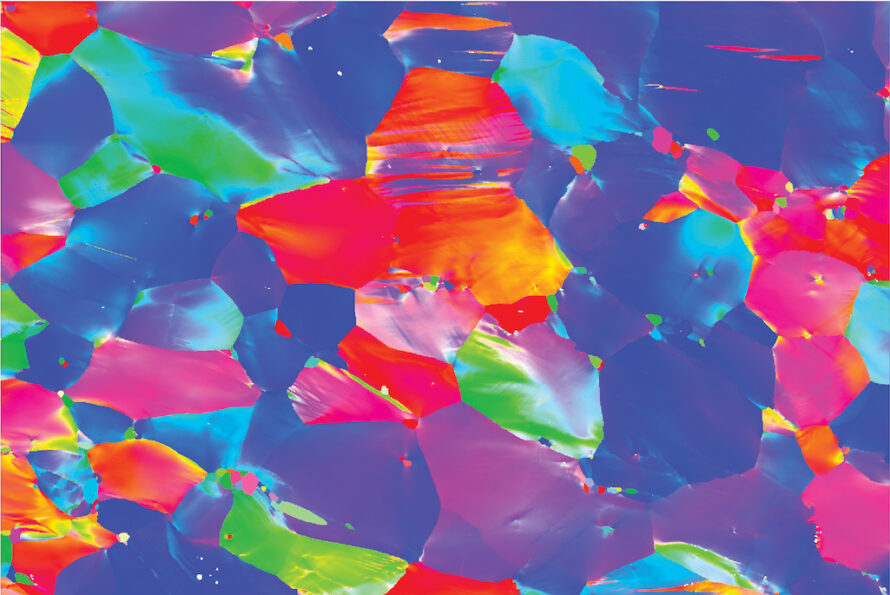 A field of pink, purple, cyan, indigo, orange, and yellow shapes packed together, resembling vibrant abstract art.