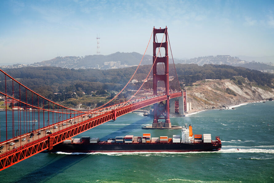 Container ship under Golden Gate Bridge in San Francisco.