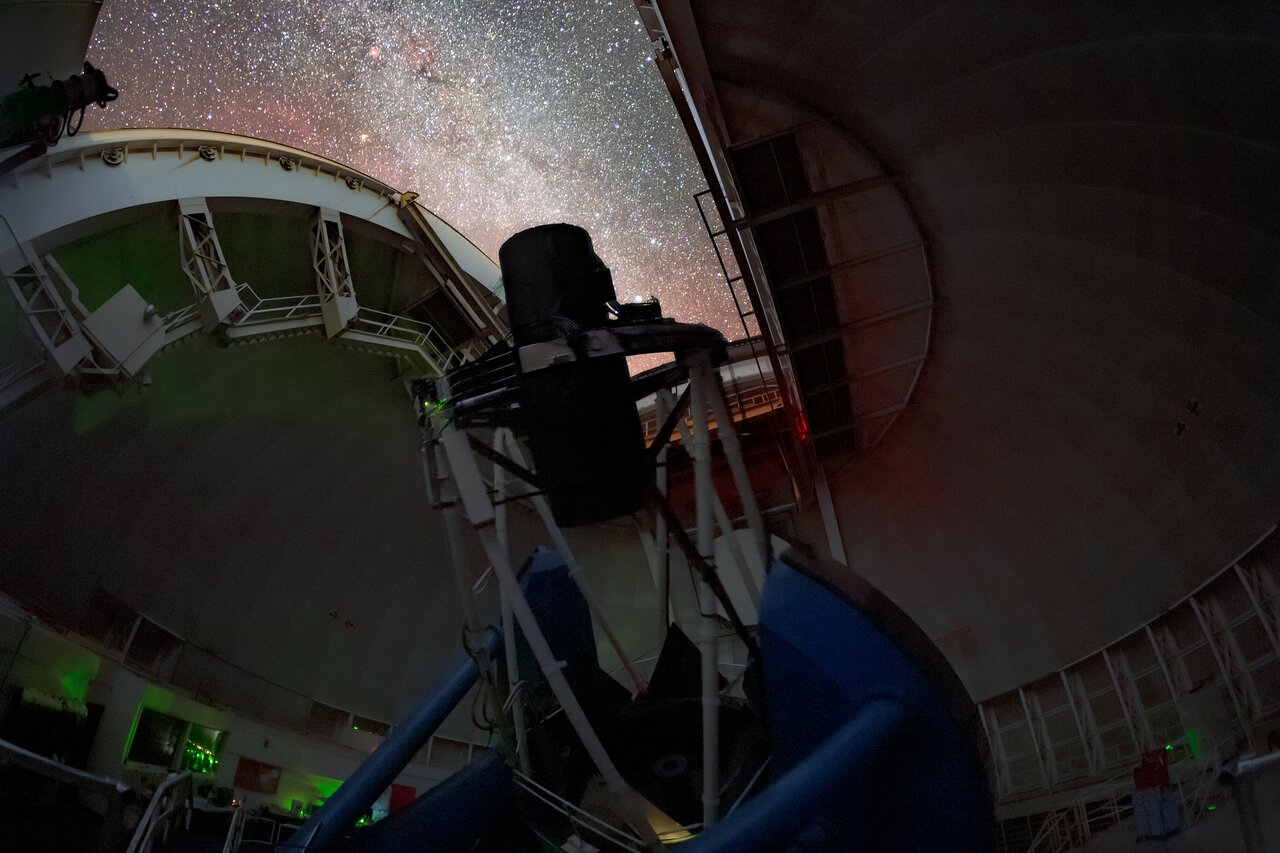 The Dark Energy Spectroscopic Instrument (DESI) making observations in the night sky on the Nicholas U. Mayall 4-meter Telescope at Kitt Peak National Observatory in Arizona. 