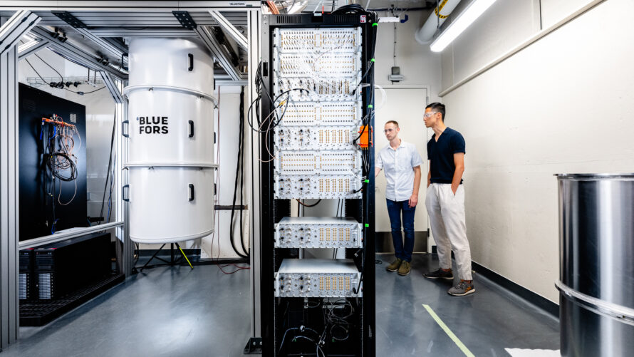 Two individuals inspecting equipment at the Argonne Quantum Foundry.