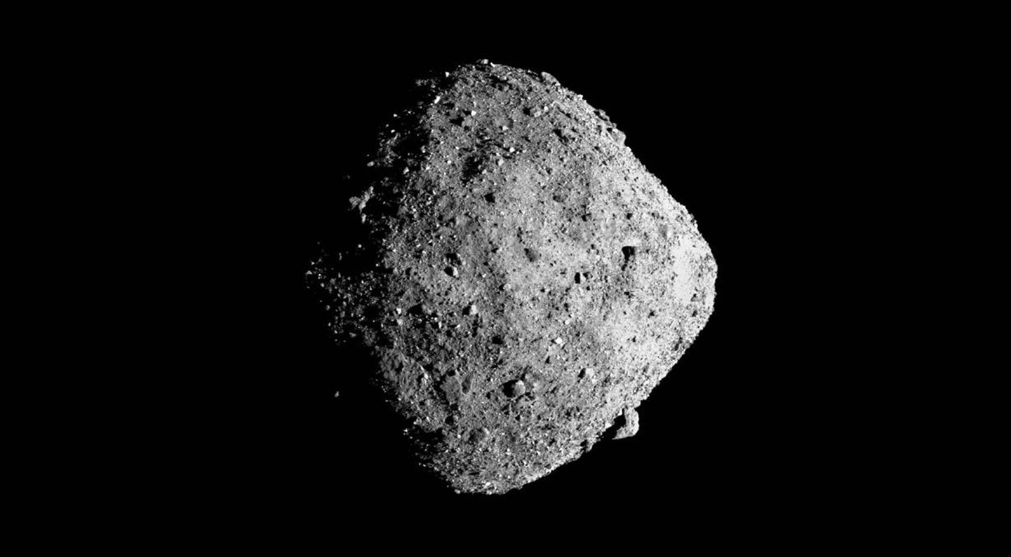 Light colored asteroid on a dark background.