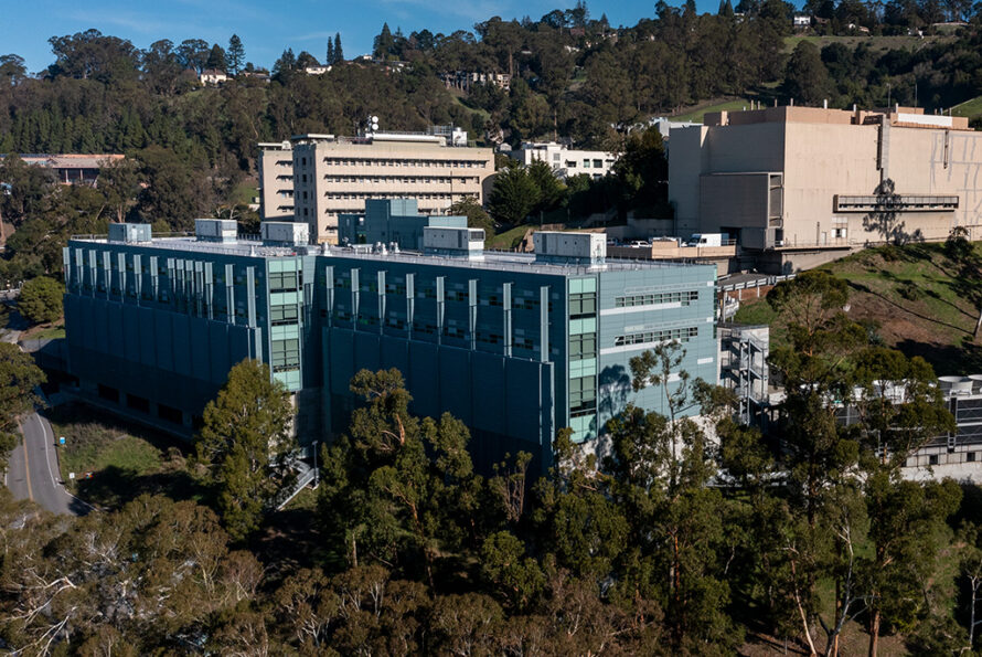 Aerial view of a large blue building.