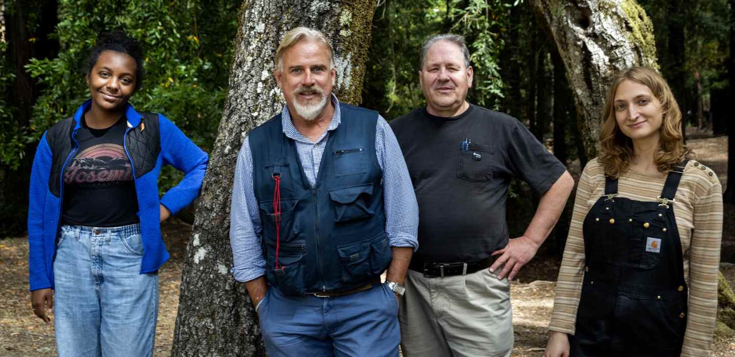 UC Berkeley researchers Matteo Garbelotto and Douglas Schmidt with community college students Lea Green and Natalie Chapman, who analyze DNA from trees affected by sudden oak death.