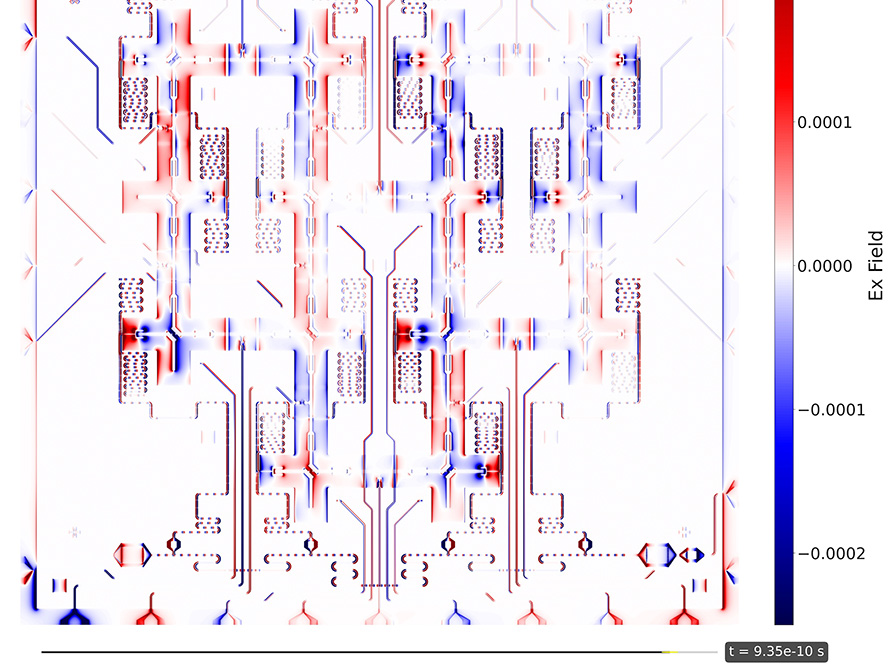 Computer-generated image of a microchip, with features and etchings of the chip colored red and blue on a white background