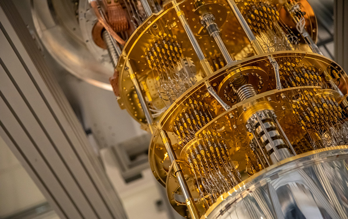 Large silvery-gray metallic device with long copper wires on the exterior.
