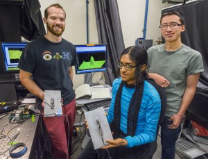 From left, Andrew Olson, Shilpa Raja and Andrew Luong are members of Paul Alivisatos's research group who used electrospinning to incorporate tetrapod quantum dot stress probes into polymer fibers. (Photo by Roy Kaltschmidt)