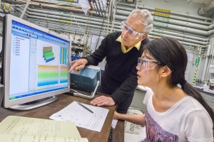 Berkeley Lab’s Heinz Frei and Miao Zhang obtained the first direct temporally resolved observations of intermediate steps in water oxidation using the Earth-abundant catalyst cobalt oxide. (Photo by Roy Kaltschmidt)