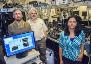 From left, Brett Helms, Frank Ogletree and Sumanjeet Kaur at the Molecular Foundry used organic molecules to form strong covalent bonds between carbon nanotubes and metal surfaces, improving by six-fold the flow of heat from the metal to the carbon nanotubes. (Photo by Roy Kaltschmidt)